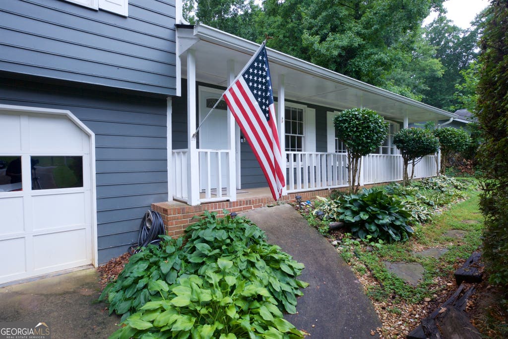 Photo of 3328 Mountain Hollow Drive, Marietta, GA 30062 (MLS # 10818216)