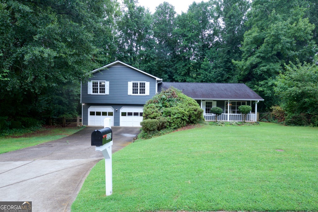 Photo of 3328 Mountain Hollow Drive, Marietta, GA 30062 (MLS # 10818216)