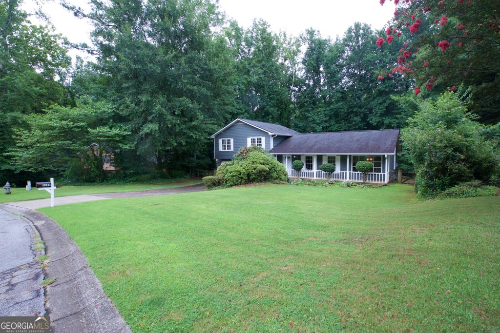 Photo of 3328 Mountain Hollow Drive, Marietta, GA 30062 (MLS # 10818216)