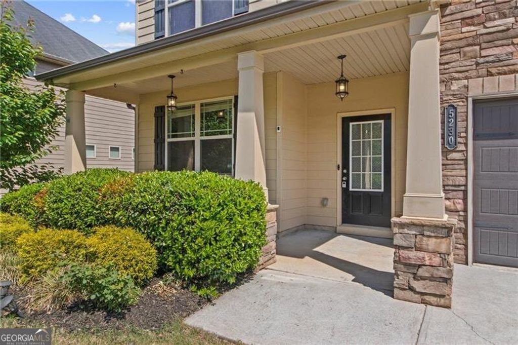 Photo of 5230 Hidden Valley Lane, Cumming, GA 30028 (MLS # 10759978)