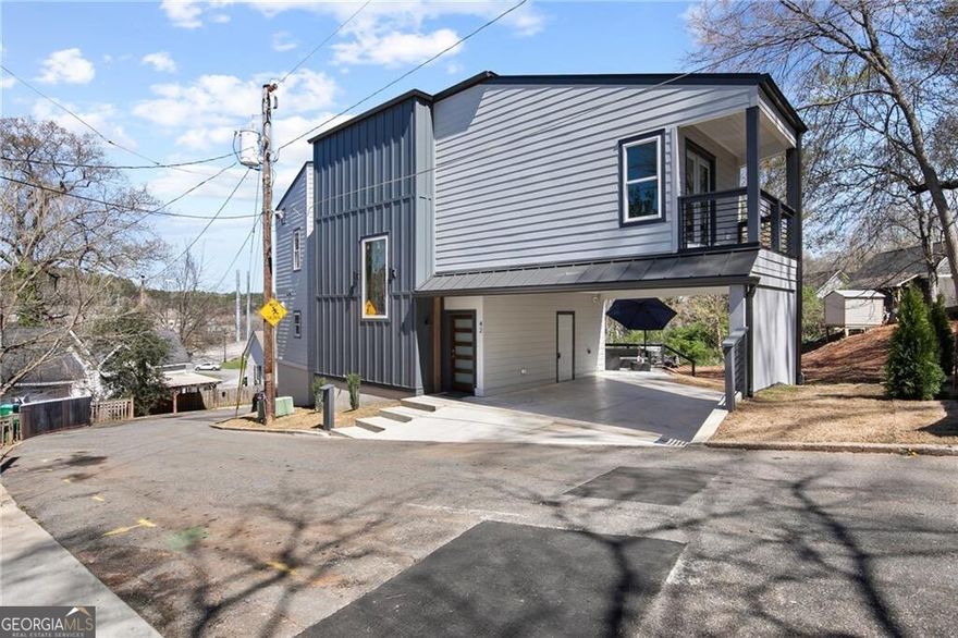 Brand New Modern Home in the Heart of Downtown Canton - 3 Bed, 2.5 Bath   2,212 SF Welcome to your dream home! This stunning brand new 2,212 square foot modern masterpiece offers the perfect blend of luxury, functionality, and style. Featuring 3 spacious bedrooms and 2.5 beautifully designed bathrooms, this home was built with premium finishes and thoughtful details throughout. Step inside to a bright and airy open-concept main level with soaring 9' ceilings, elegant recessed lighting, and a built-in speaker system throughout the home - perfect for entertaining or everyday living. The gourmet kitchen is a showstopper, boasting premium-style cabinets with abundant storage, sleek quartz countertops, and a luxury stainless steel appliance package. The entire home is outfitted with waterproof luxury laminate flooring, adding durability and a seamless modern look. A striking metal cable-style handrail adds a unique architectural touch to the interior. Both full bathrooms are designed to impress with huge walk-in showers and double vanities, offering spa-like comfort in your own home. Located in Downtown Canton, you're just a short walk to charming restaurants, breweries, shops, and all the small-town charm the area has to offer. Plus, you're only minutes from I-575, with the North Georgia Mountains just 20-30 minutes away and Downtown Atlanta within 45 minutes - the perfect balance of city access and natural beauty. Don't miss this incredible opportunity in one of Canton's most up-and-coming areas - homes like this don't last long. Contact the listing agent today for more information!