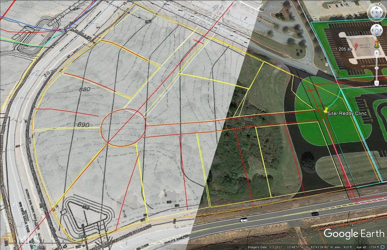 Large 9.99 acre parcel in front of Walton BOE. 4 sided road frontage. All Utilities. Zoned B-3 Commercial. Ideal for office or business setting. Located in Opportunity Zone.