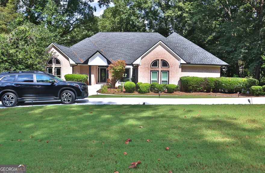 Welcome to Eagles Landing Golf and Country Club - where luxury living meets resort-style amenities.  This stunning Executive Ranch on a full finished basement is a rare gem that offers comfort, style, and space in one of the area's most sought-after communities.  The main level features a spacious owner's suite with a cozy sitting area-perfect for winding down with a favorite movie or game before bed. The en-suite bath includes double vanities, a private water closet, and all the comfort you'd expect in a retreat-style space.  Hardwood floors flow throughout the main living areas, complementing the beautifully appointed kitchen, which features stainless steel appliances, solid surface countertops, and ample cabinetry-ideal for preparing everything from everyday meals to holiday feasts.  The fully finished basement is a showstopper, offering three additional bedrooms, a generous open living and gaming space, and a private executive-level office-perfect for working from home. This versatile lower level offers endless possibilities, whether you're dreaming of a home theater, fitness studio, or entertainment hub. Let your creativity shape the ultimate basement retreat.  Don't miss this rare opportunity to own in Eagles Landing, where elegance, functionality, and community come together.
