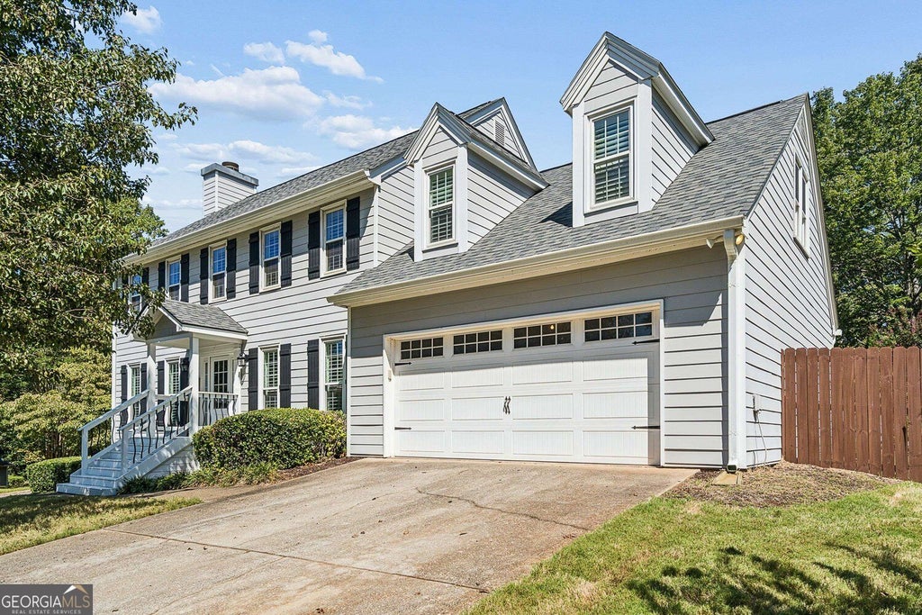 Photo of 939 Flowers Crossing, Lawrensville, GA 30044 (MLS # 10848473)