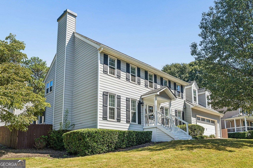 Photo of 939 Flowers Crossing, Lawrensville, GA 30044 (MLS # 10848473)