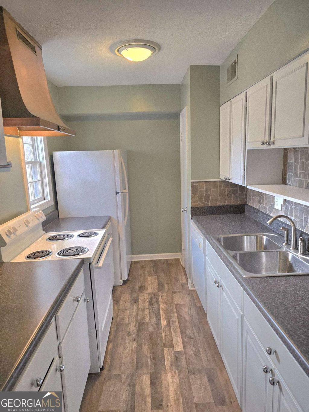 Photo of 3091 Colonial Way #H4, Atlanta, GA 30341 (MLS # 10690683)