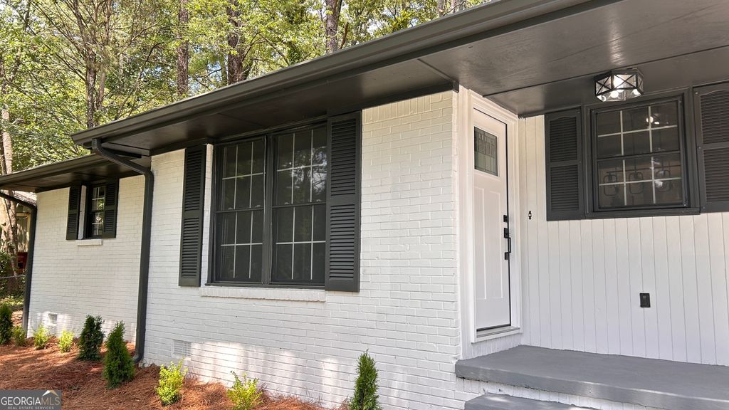 Photo of 5324 Joan Of Arc Place, Atlanta, GA 30349 (MLS # 10679598)