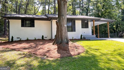 Photo of 5324 Joan Of Arc Place, Atlanta, GA 30349 (MLS # 10679598)