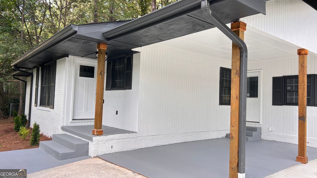 Photo of 5324 Joan Of Arc Place, Atlanta, GA 30349 (MLS # 10679598)