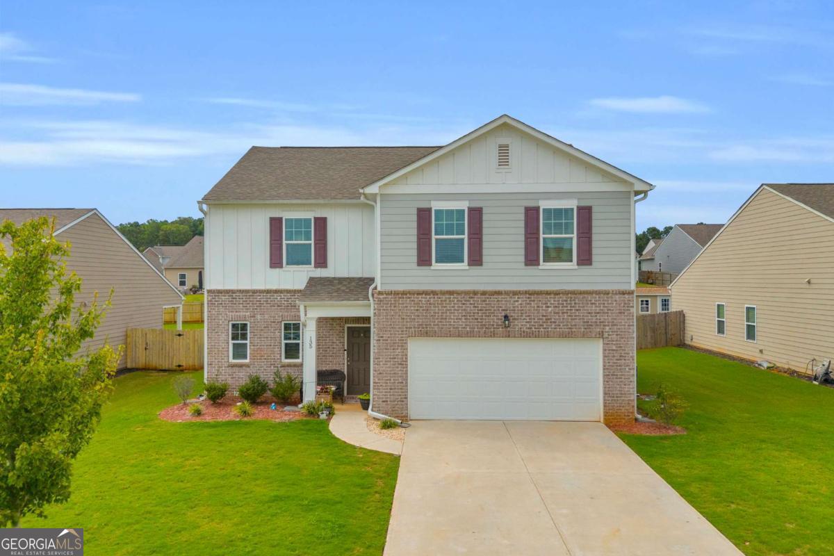 Welcome to this move-in ready 4 Bed / 2.5 Bath home located in the Creekside community of Monroe. Built in 2021, this 2,313 sq. ft. traditional home offers modern construction and an open floor plan designed for today's lifestyle. The spacious kitchen features white cabinetry, stone countertops, a breakfast bar, and a walk-in pantry. The kitchen flows seamlessly into the dining area and family room, making it ideal for both everyday living and hosting. Upstairs, the private owner's suite includes a walk-in closet and bathroom with a walk-in shower. A versatile loft offers additional space for a home office, playroom, or second living area. Enjoy outdoor living in the partially fenced backyard - offering privacy from neighbors. Neighborhood amenities include a pool and playground. With convenient access to Hwy 78 and Hwy 83, commuting to Athens or Loganville is easy. Zoned for Walton County schools: Monroe Elementary, Carver Middle, and Monroe Area High. Don't miss this opportunity to make this HOME!