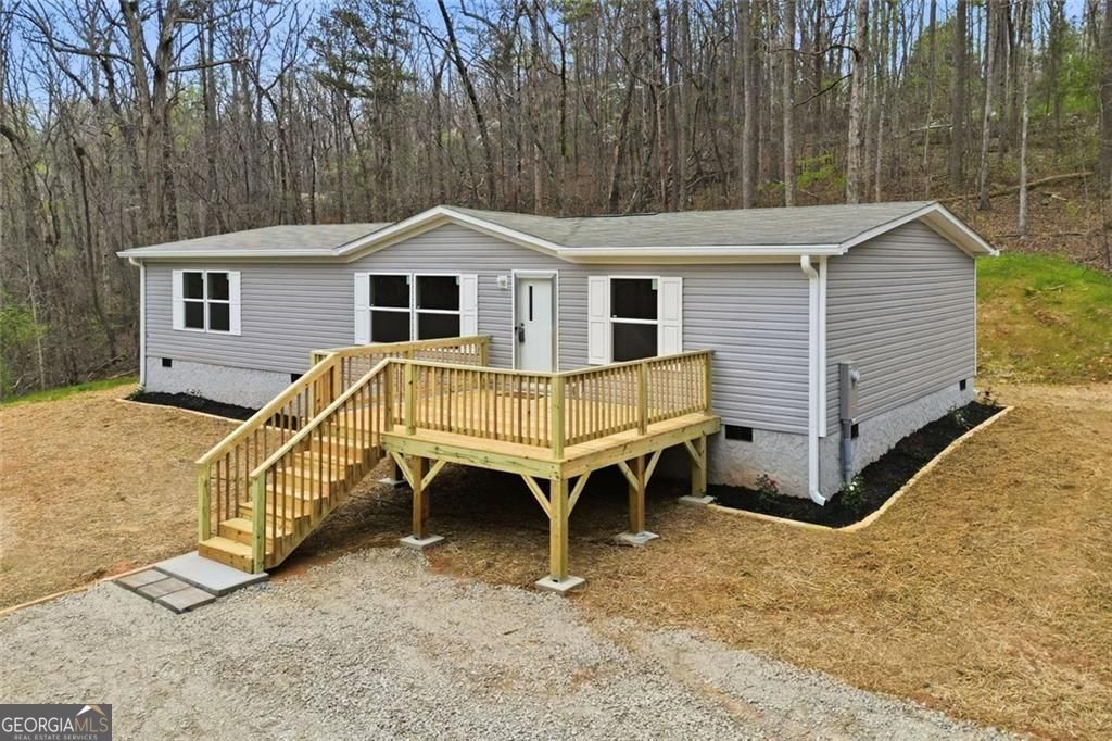 Photo of 240 Cherokee Wood Hollow Dr, Ball Ground, GA 30107 (MLS # 10722453)