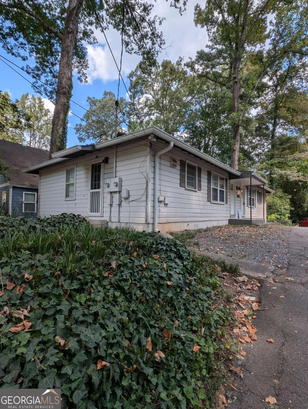 Amazing central location across the street from the Beltline at Bobby Jones/Bitsy Grant Recreation center. Minutes to Piedmont Hospital medical community, as well 1/4 mile from the Northside Drive/I-75 access. Charming 2 bed 1 bath duplex is quiet and move-in ready. Hardwood floors, paint and updated touches make this a great place to call home. Stainless Steel appliances, gas stove, granite countertops, hurry! Private deck off the rear and a full laundry is located in the basement with secure dry storage for this home. Off street parking. Sorry this home does not qualify for ANY vouchers. Showings begin Sept 22.