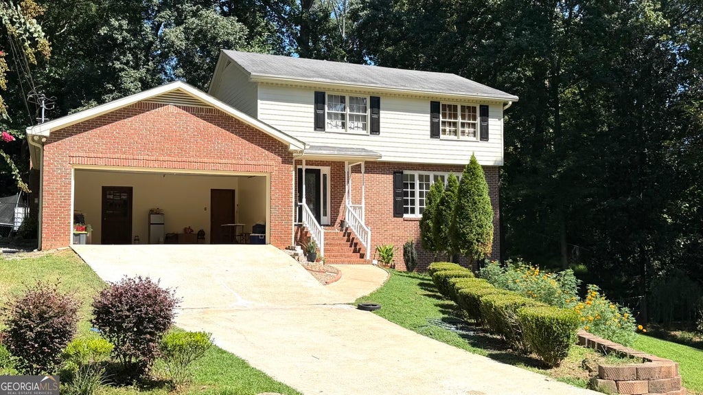 Photo of 574 Hickory Hills Court, Stone Mountain, GA 30083 (MLS # 10838772)