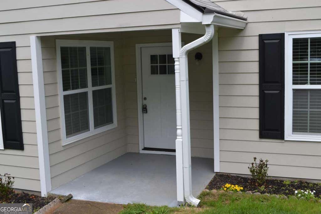 Photo of 5134 Hill Farm Drive NE, Woodstock, GA 30188 (MLS # 10808767)