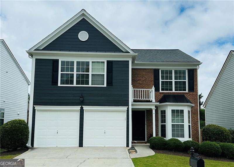This move-in ready 3-bedroom, 2.5-bath home is tucked near a quiet cul-de-sac in one of Woodstock's most desirable neighborhoods, offering a great blend of comfort, function, and community living. Step inside to find an open-concept kitchen and living area, perfect for everyday living and entertaining. The spacious primary suite features a large walk-in closet, along with a private bath that includes a separate tub and shower. The two secondary bedrooms share a full hall bathroom, making it a great setup for family or guests. A large laundry room on the main level adds convenience, along with a half bath for guests. Outside, the fenced-in backyard offers a safe and private space-ideal for kids, pets, or relaxing outdoors. Enjoy neighborhood amenities including two pools (one resort-style), tennis, basketball, volleyball, a playground, clubhouse, and walking trails-all just minutes from downtown Woodstock's shops, restaurants, and parks.