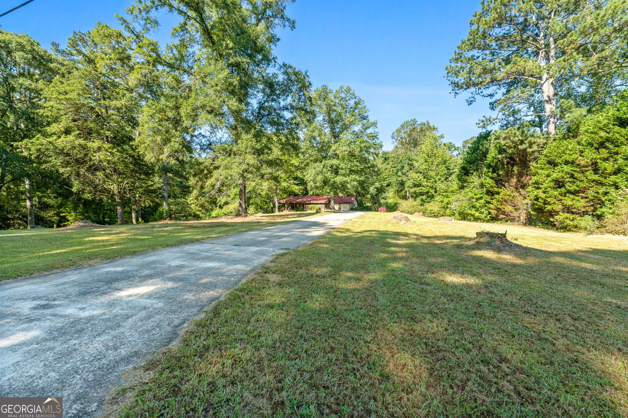 This ranch-style home, nestled in a sought-after location in Senoia offers great potential but is in need of some tender loving care (TLC). The home is situated on a spacious lot, offering plenty of room for outdoor activities or future landscaping. The property boasts a full basement, providing ample space for storage, additional living areas, or the opportunity to expand. Inside, the layout features classic ranch home characteristics, with a welcoming open floor plan that includes a cozy living room, a functional kitchen, and comfortable bedrooms. While the home may require updates and repairs, its bones are strong, making it a perfect project for buyers looking to put their own personal touch on it.