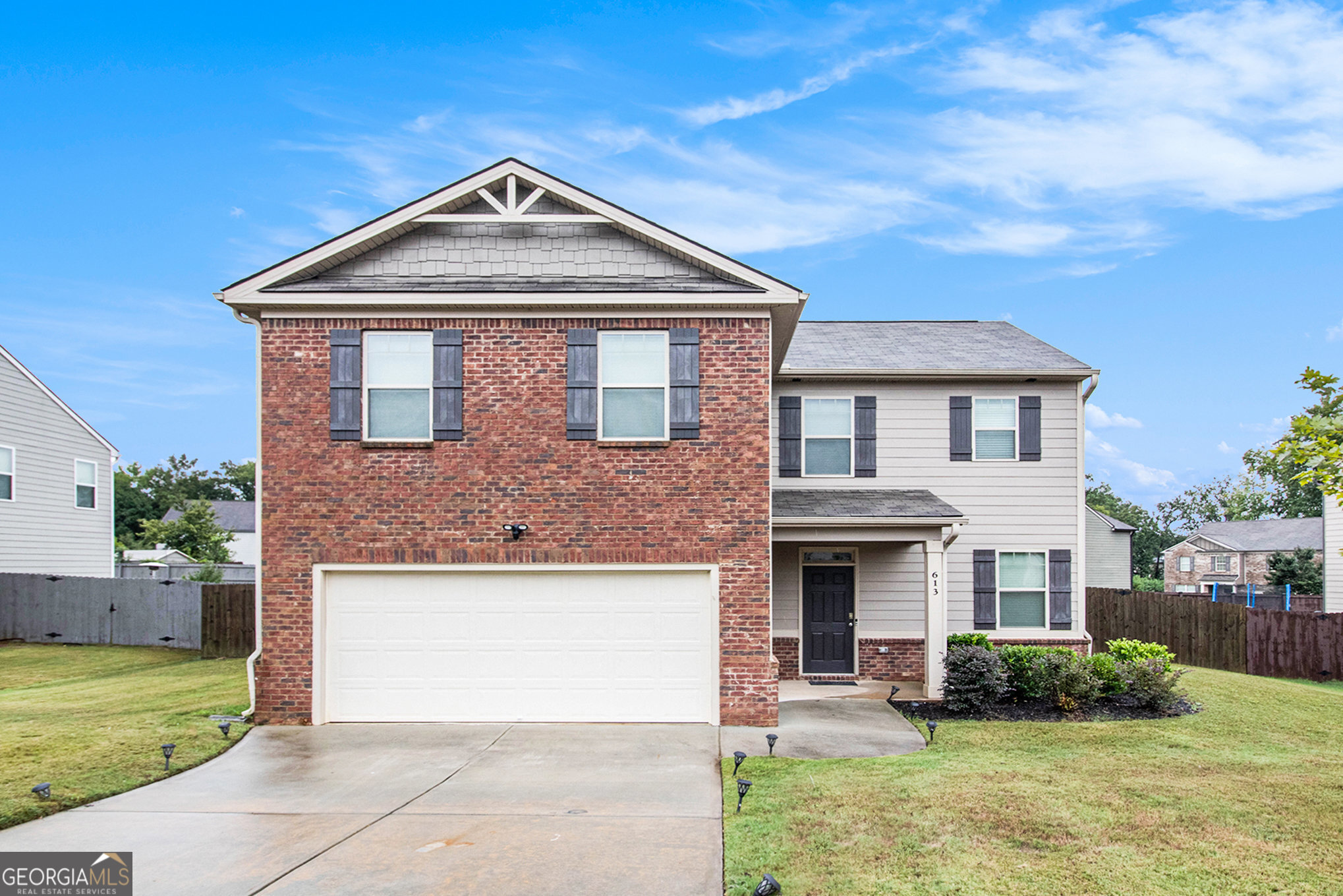 Discover comfort and style in this 4-bedroom, 2-bath home built in 2020, featuring a spacious open-concept layout perfect for modern living and entertaining. The kitchen showcases a granite island ideal for casual breakfasts, along with a dedicated dining area for more formal meals. The inviting family room centers around a cozy fireplace, creating a warm and welcoming atmosphere. Retreat to the private owner's suite, complete with dual vanities, a separate shower, and a luxurious garden tub designed for relaxation. Enjoy community amenities including scenic walking trails, a sparkling pool, and playground-offering something for everyone to enjoy. This home is also eligible for 100% USDA financing-an incredible opportunity for qualified buyers!