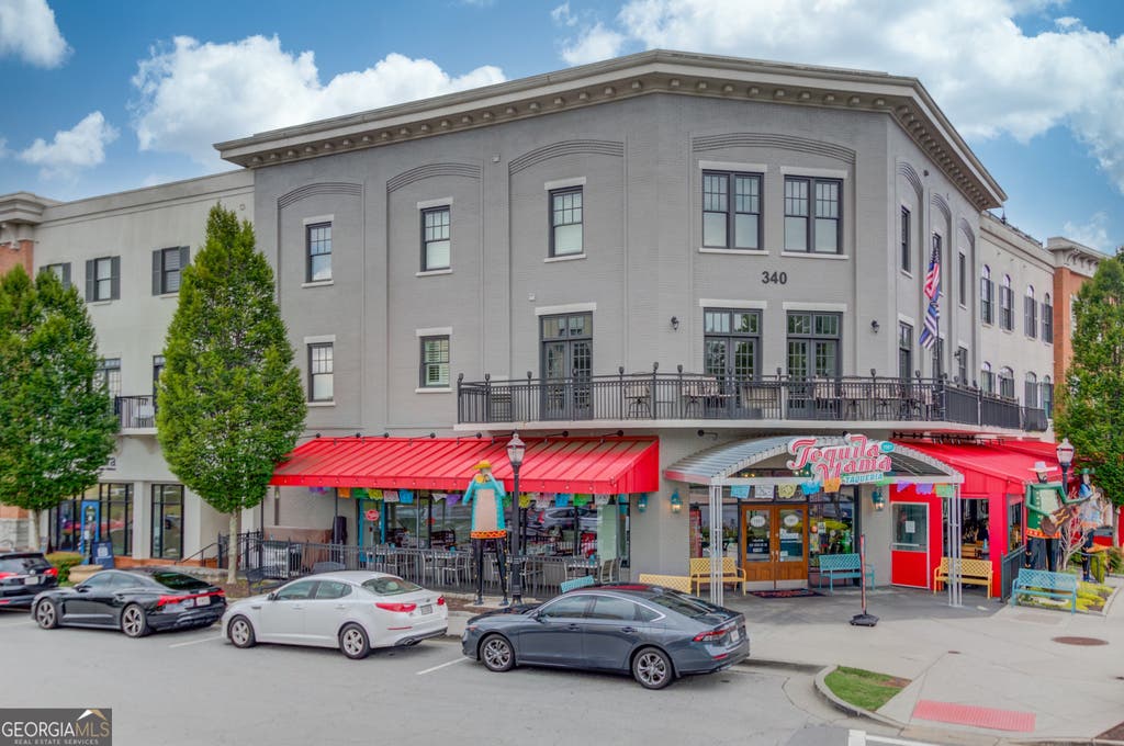Photo of 3930 Charleston Market Street #218, Suwanee, GA 30024 (MLS # 10812780)