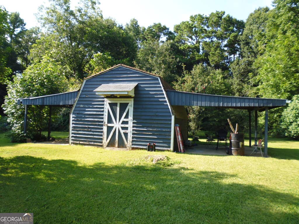 Photo of 307 Sunset Dr Extension, Griffin, GA 30223 (MLS # 10831466)