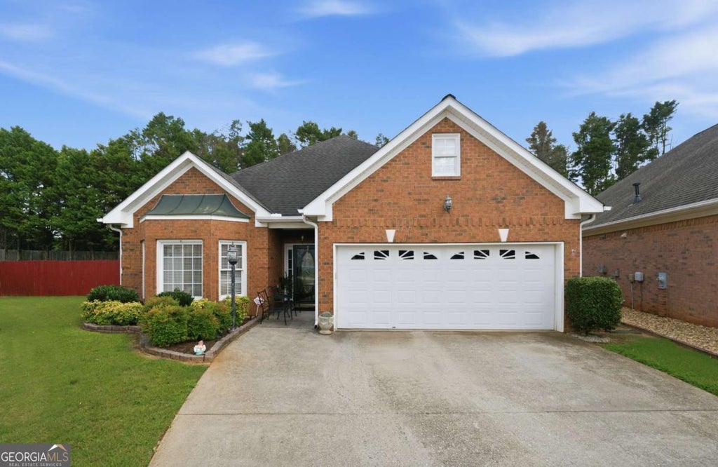Photo of 2220 Stockton Walk Lane, Snellville, GA 30078 (MLS # 10810073)