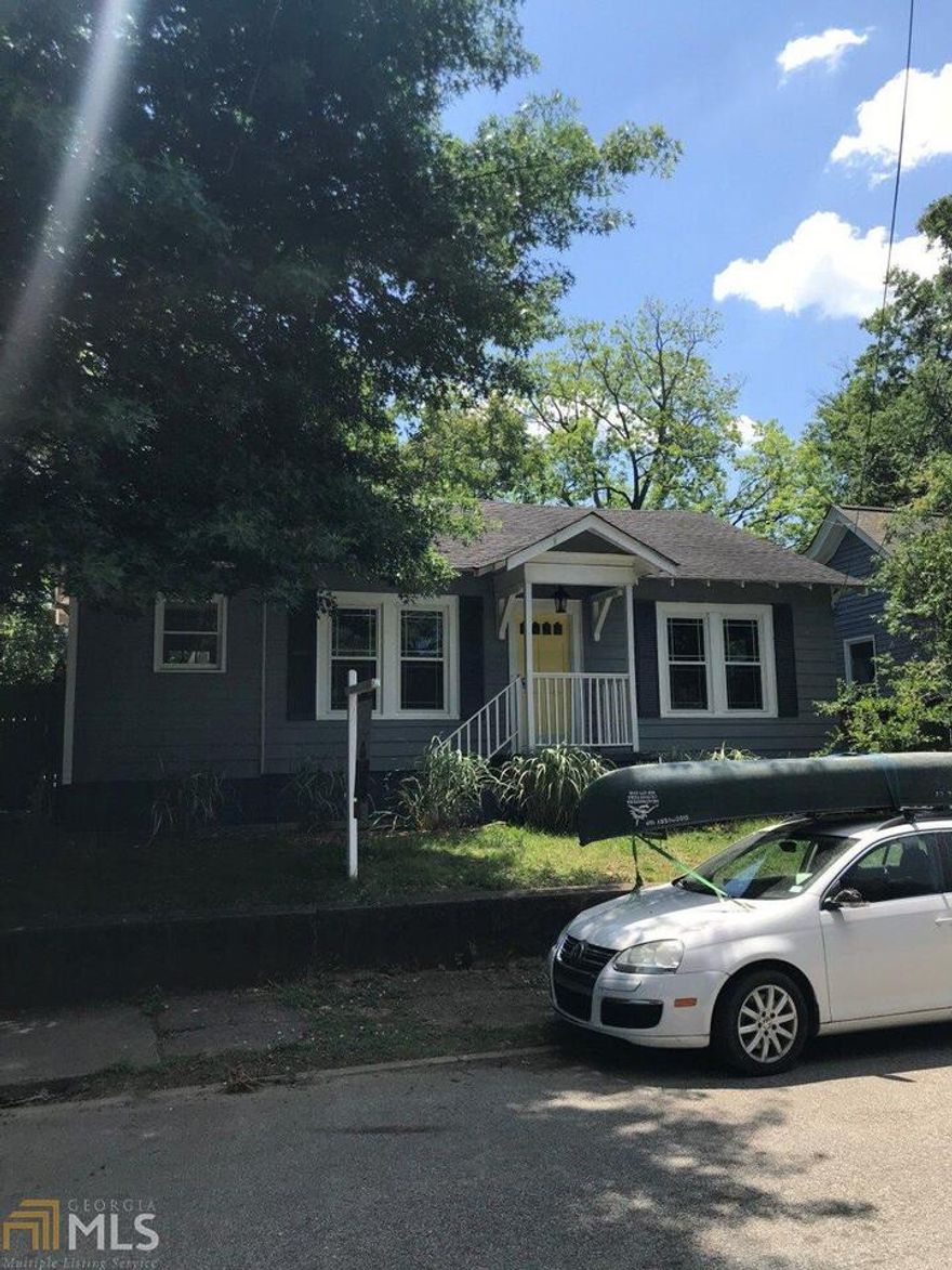 Adorable cottage walking distance to everything in EAV! Hardwoods throughout, updated kitchen, vaulted ceilings and off street parking!  Perfect roommate plan with A 3rd bedroom or office. Sweet private backyard for cookouts and parties.   There are also outbuildings that would be great for storage or a small workshop.