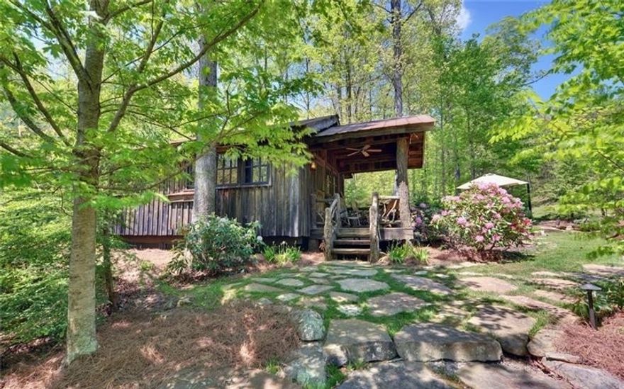 Wintermont - 248 ac in the North GA mountains the property features a cove forest w/walking trails,  110ft waterfall, beautifully landscaped trout pond, numerous creeks and additional waterfalls, gated and paved roads, underground utilities, the eastern boundary is the Dawson Forest Wildlife area, a 20,000+ ac preserve.  The property features a BARN that has been turned into a delightful 1bdrm/2 bth residence w/ full kitchen ss appliances and a darling COTTAGE finished in antique barn wood, fully equipped kitchen with bdrm and bath sleeps 5 w/  &  outdoor stone fire pit