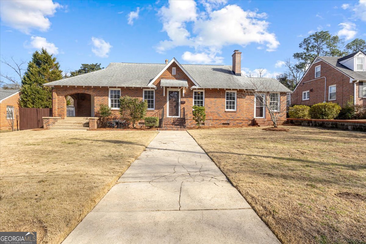 Charming 1925 Home with Modern Upgrades & Separate Income-Generating Apartment in Historic Vineville! Step into the perfect blend of history and modern living with this beautifully restored 1925 home, nestled in the heart of Macon's sought-after Vineville neighborhood. Located just moments from the interstate, local restaurants, parks, shopping, and everything Macon has to offer, this home offers unparalleled convenience while preserving the charm of yesteryear. This 4-bedroom, 2-bathroom residence showcases timeless character with its original hardwood floors, rustic fireplace, and historic windows, all thoughtfully preserved. Every corner of the home has been renovated to meet today's standards, featuring an upgraded kitchen and bathrooms that seamlessly blend classic style with modern amenities. Whether you're cooking in the stylish kitchen or relaxing in the spacious living areas, you'll find comfort and elegance at every turn. But the charm doesn't end there! The property also includes a 2-bedroom, 1-bathroom apartment dwelling located in the backyard, offering a great opportunity for rental income or a private guest suite. This independent space is perfect for anyone looking for additional space or the potential for passive income. With a prime location and an ideal balance of historic features and contemporary updates, this home is truly one-of-a-kind. Don't miss the chance to own a piece of Macon's history, while enjoying the conveniences of modern living!