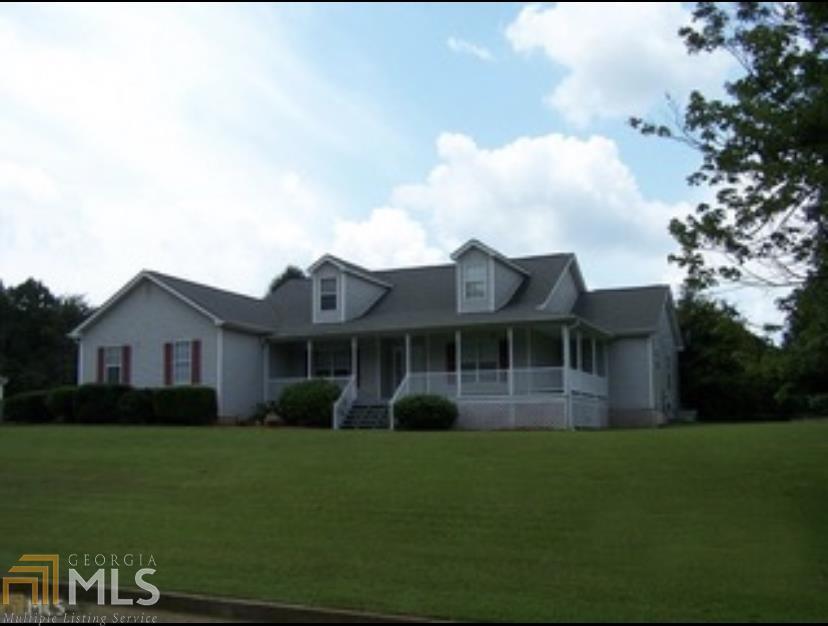 This Beautiful Home Won't Last Long! Located in the McDonough/Locust Grove area. Conveniently located near shopping, medical facilities and major highways. This home features 4 bedrooms and 2 baths, A huge master bedroom double treyed ceiling with 2 oversized walk in closets, separate shower and garden tub. Featuring a split bedroom plan, this home has it all. Home has a huge foyer entry into family room w/gorgeous newly tiled fireplace, formal dining room, breakfast bar and eat in kitchen. This home features a huge 30x32 bonus room/4th bedroom with deep dormers that can be converted into closets and lots of attic storage. Beautiful new salt water pool that connects to the newly carpeted covered back porch via the new deck, fenced in backyard with room to roam. Great for outdoor activities and gardening. Large wrap around front porch. Home interior has been totally renovated to include: freshly painted interior, new stainless steel appliances, beautiful new luxury waterproof vinyl flooring, freshly painted cabinetry, new led light fixtures throughout, under cabinet lighting, new faucets, new wifi enabled garage door opener. All knobs, air vents, handles, door knobs and hinges have been changed entirely throughout the home. Need more parking space? A brand new detached 22x34 vinyl sided 2 car garage with garage door opener and 100 amp electrical service with 220 outlet has been added. Large front and backyard space. Laundry room with utility storage cabinets, new hot water heater, new toilets. Too much to list. House is occupied by the owners.