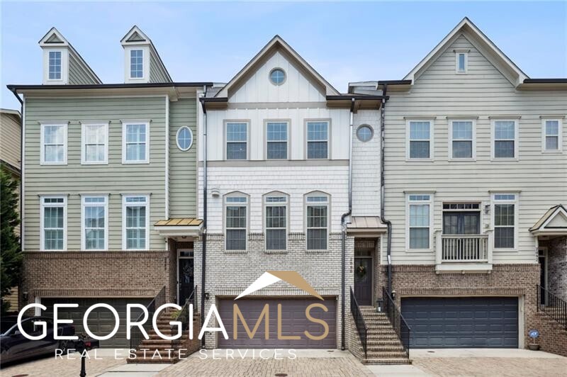 The perfect blend of luxury and comfort this 2015 Brock Built townhome is now available in the desirable Upper Westside neighborhood of Vinings on the Chattahoochee. An ideal location within the city close to Westside Village shopping & restaurants, The Battery, Midtown, Downtown, Buckhead, Vinings, the Beltline, Whittier Mill Park & the airport. Great highway access. Enjoy the city life and then relax with your neighbors at the community pool, only two blocks away. Amenities also include a community playground, clubhouse, tennis courts and fitness center. Bright, natural daylight-filled open concept floor plan, perfect for entertaining with friends and family while maintaining the privacy of bedrooms on the second level. Upgrades include smart home features, energy efficient insulated windows, real hardwood floors, stone surround fireplace & built-in cabinetry. 10-ft ceilings on main, huge kitchen island, SS appliances, Butler's pantry, and tons of kitchen cabinet space! Conveniently located pocket office adjacent to the kitchen. Private deck off of the kitchen with treelined view. Three bedrooms on upper level including an oversized Primary suite with large closet and bath. Terrace level can be whatever you need it to be - 4th bedroom, office, media room, home gym, or In-Law suite (Murphy bed included). This home features large scale 24' wide open concept living at its best. 10' ceilings, crown molding. Your back deck and lower patio open up to a flat private fenced-in yard mowed by the HOA! Stunning light-filled kitchen is the heart of the home with views to family room and dining space. Upstairs laundry is super convenient. 2 car garage with storage space. Where else will you find ITP newer construction for under 500k? Stacked with extras and custom design features such as bookshelves/storage in living room, judges paneling wall detail, wine storage/glass cabinetry in kitchen, upgraded recessed lighting, under cabinet kitchen lighting, upgraded lighting package, level 2 S/S appliance package. Minutes to Bellwood Quarry Westside Park and Chattahoochee River trails at Whittier Mill Park. An incredible value for this much high-end finished square footage in the city.