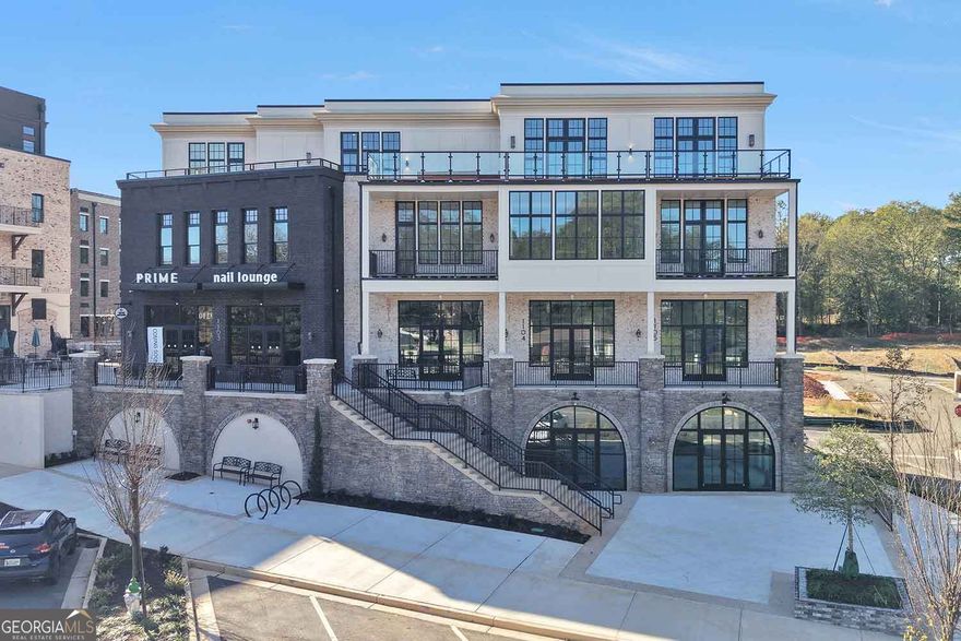 ** NOTE: images of FINISHED property are FOR ILLUSTRATIVE PURPOSES ONLY and are NOT of the subject property. ** NEW CONSTRUCTION PENTHOUSE CONDO in ADAIR PARK, Downtown Woodstock's most coveted address. Bring your designer or use ours - this is an unprecedented opportunity to completely customize the interior finishes. At contract the residence will be in "white box" condition, and a $500,000 allowance is included in the purchase price for your personal selections. Everything from cabinets to countertops, lighting to tile, flooring to faucets are all customizable to your taste. If you prefer a turnkey solution, we can provide a designer package to fit your style. The excitement of this extraordinary offering begins before you even step inside. Adair Park is quickly gaining status in Downtown Woodstock as the place to be, and this penthouse is located in what is destined to become one of the area's most talked-about architectural achievements. Some details: Private elevator right into your residence; 4-car private garage parking, 11 foot ceilings; 4 Bedrooms, 3.5 Baths; extensive outdoor rooftop living space with luxury hot tub included; luxurious primary suite with stunning spa-like bath; gourmet kitchen with oversized island; secure pedestrian entry lobby for residents and guests accessible from Main St and so much more. Discover all that Adair Park has to offer. ItCOs more than just a place to liveCoitCOs a home filled with warmth, community, and a shared sense of belonging.