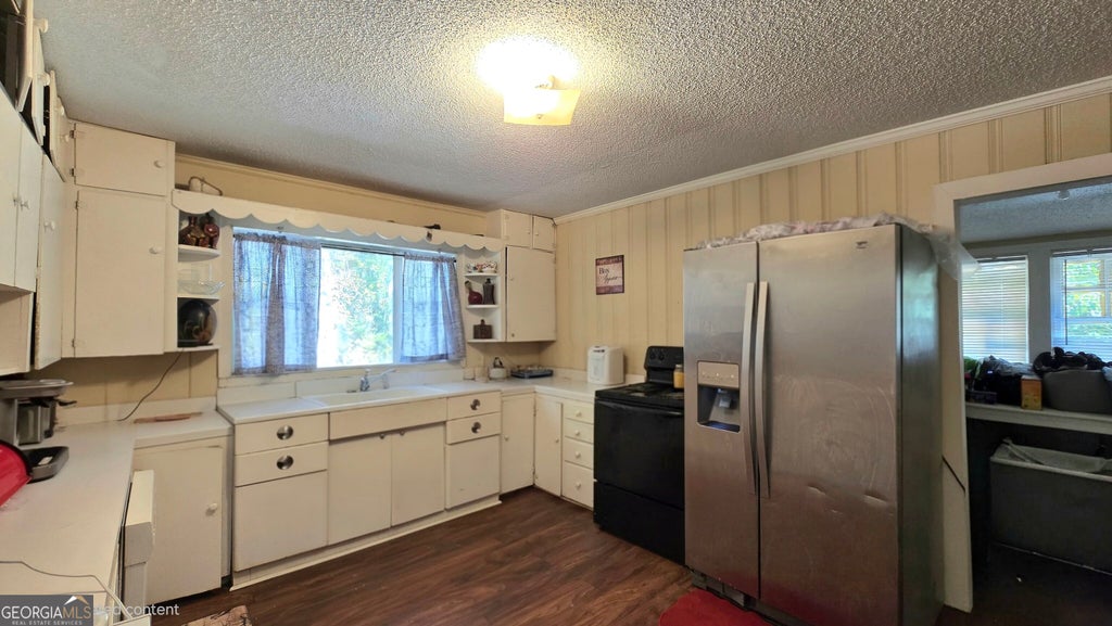 Photo of 397 Dock Hyde Rd, Carrollton, GA 30116 (MLS # 10851039)