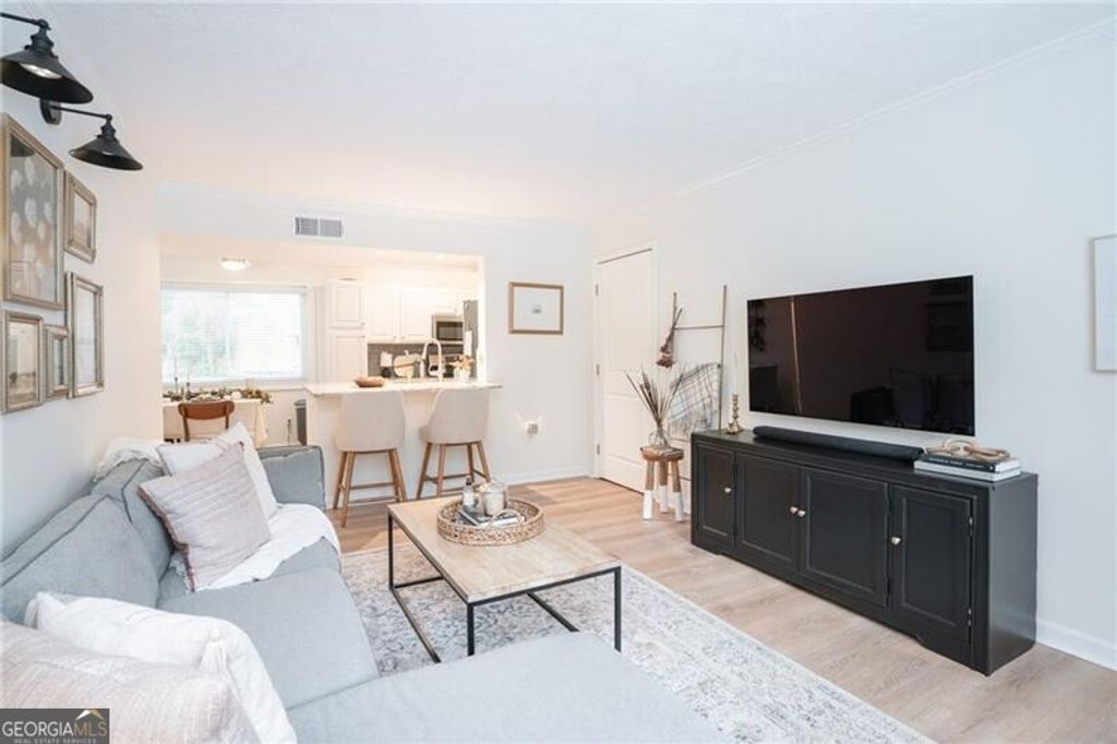 Photo of 100 Biscayne Drive NW #D1, Atlanta, GA 30309 (MLS # 10666632)