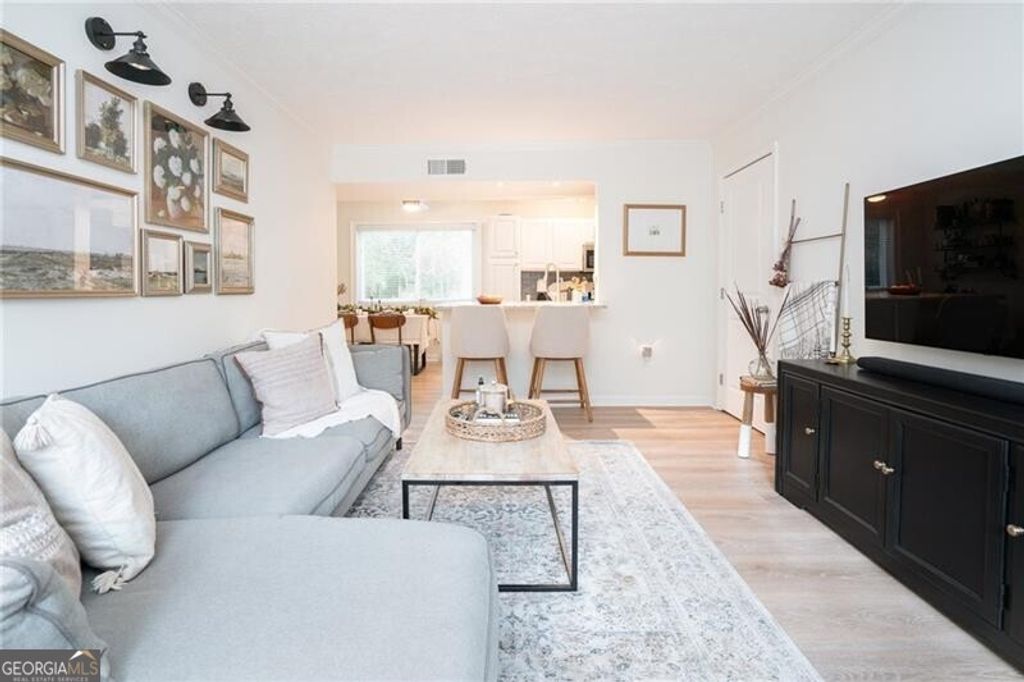 Photo of 100 Biscayne Drive NW #D1, Atlanta, GA 30309 (MLS # 10666632)