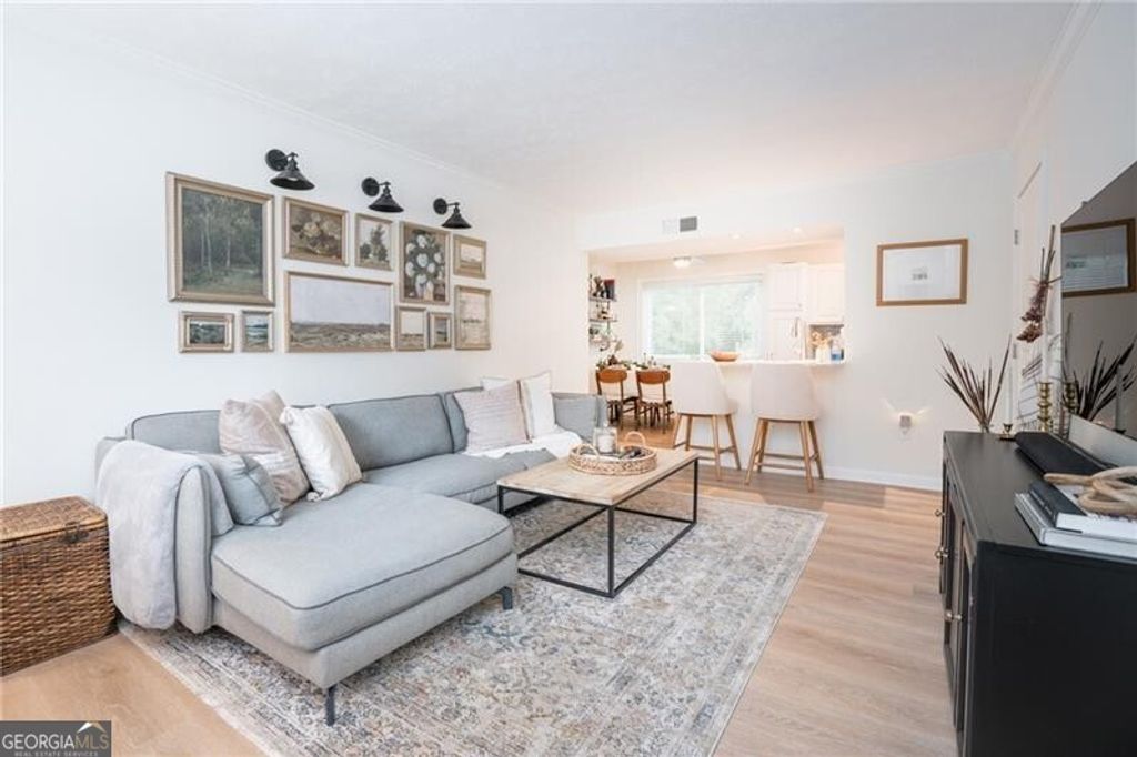 Photo of 100 Biscayne Drive NW #D1, Atlanta, GA 30309 (MLS # 10666632)