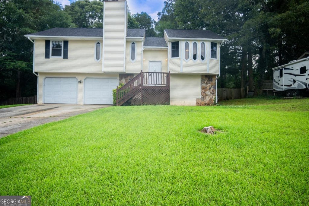 Photo of 381 Windsor Walk SE, Conyers, GA 30094 (MLS # 10786484)
