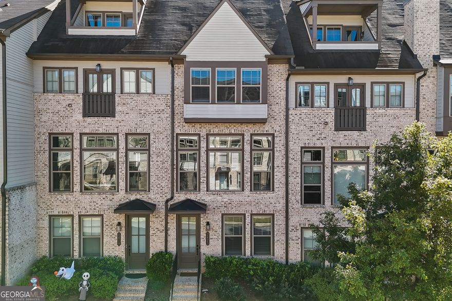 Luxury Meets Convenience in a Prime Location! Discover this stunning 3-story townhouse in a highly sought-after Reverie on Cumberland gated community that perfectly blends style, comfort, and location. Freshly painted throughout, this elegant home offers 3 bedrooms, 3.5 bathrooms, hardwood flooring on most levels, and 10-foot ceilings on every floor. Enjoy a gourmet kitchen featuring an oversized island, quartz countertops, white cabinetry, and stainless steel appliances-all overlooking the open-concept family room highlighted by contemporary light fixtures. The spacious owner's suite includes double vanities, a large walk-in shower, and an expansive closet, while all bathrooms have been tastefully upgraded for a modern touch. The in-law suite with a full bath provides flexibility for guests, a home office, or extended family. Plus, there's an option for a future elevator, offering long-term convenience. Step outside to a newly stained deck with open neighborhood views-no buildings blocking your sightline-perfect for relaxing or entertaining. Community amenities include a pool, clubhouse, BBQ area, and fitness center. The HOA covers exterior maintenance, lawn care, amenities, and trash service, ensuring a low-maintenance lifestyle. Perfectly located near Truist Park, The Battery Atlanta, Cumberland Mall, Vinings, and the Silver Comet Trail, with easy access to I-285 and Midtown Atlanta. Experience luxury, convenience, and community all in one exceptional home. Schedule your private tour today!