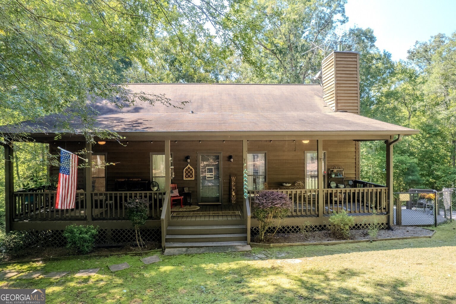 Wonderful home on almost 9 acres! You will truly feel as if you are on vacation in the mountains when you come home from work to this Gorgeous Rustic/Contemporary style home. This home also has a finished basement that has been made into a mother in law apartment with full kitchen living area and bath. The apartment has its own access in and out and also has it's own fenced in area in back yard. The main home has 4 bedrooms and 2 full baths. The 4th bedroom is actually a bonus room but does have a window and space for a closet. There is over 2,600 sqft and the master bedroom is on the main floor with 2 other bedrooms on this floor as well. The property goes back into the woods and right to a fully stocked pond. There's huge decks all around and a fenced in back yard as well. The kitchen has appliances and a super cute built in coffee bar. Many upgrades and things have been done in the last few years to include a remodeled master bath, new HVAC, exterior painting, tankless hot water heater and so much more but do come see this beautiful mountain style home for yourself!