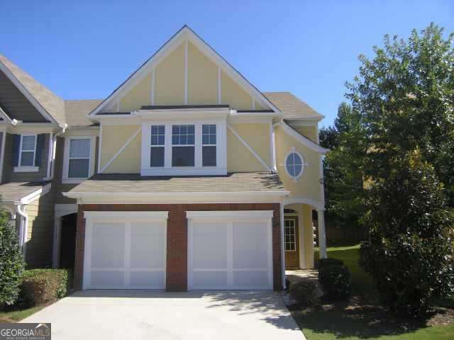 Welcome home to this amazing town home in Kennesaw . This open concept floor plan features a spacious Family Room, Dining Room and Breakfast area - perfect for entertaining and everyday living! Family Room offers gas log fireplace and an abundance of daylight. Separate Dining Room is open to Family Room. There's a half bath and coat closet in the hallway. This "perfect work triangle" Kitchen features granite counters, stainless steel appliances, and large pantry. Generously sized Laundry Room is conveniently located upstairs. The oversized primary suite features large walk-in closet and roomy primary bathroom with separate tub and shower, double vanity with lots of counters space, linen closet and semi-private toilet. There's space in the attic for extra storage and 2 car garage. Swimming pool, yard maintenance, fitness facilities, water, sewer, and trash pick up included in the HOA dues for low maintenance living. Ellison Lake - just beautiful, and right across from your front door. Convenient to Kennesaw Mountain Park, Kennesaw State University, Kennestone Hospital, I-75, and I-575, Marietta Square, and Barrett Pkwy. New roof 1/2025