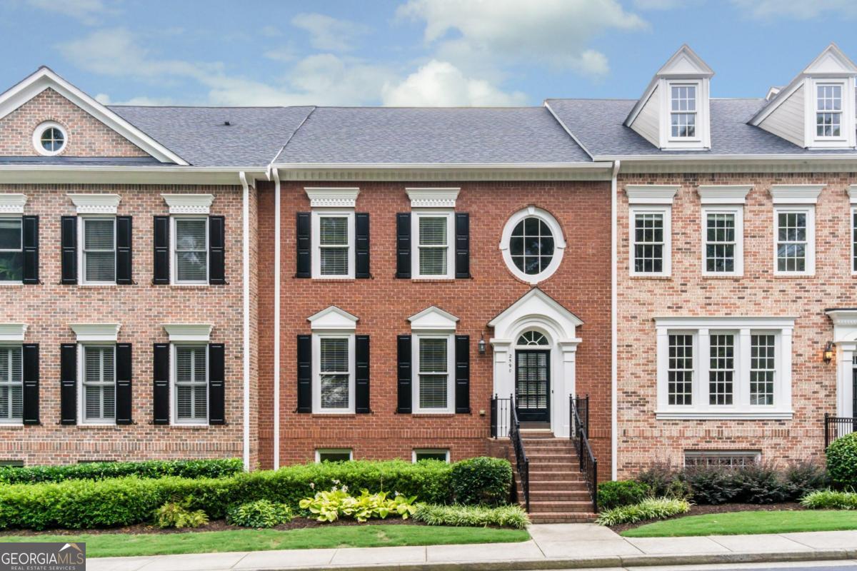 Move-In Ready Townhome in the Heart of Downtown Alpharetta! Welcome to this stunning 4-bedroom, 3.5-bath townhome located in the highly sought-after gated community of Academy Park, offering direct private access to both Avalon and Downtown Alpharetta via exclusive resident gates. This exceptional home is perfectly positioned for enjoying all the shopping, dining, festivals, and entertainment the area has to offer. Step inside to a bright two-story foyer and be greeted by beautiful hardwood floors throughout the main level and upstairs hallway. The main floor features a spacious formal dining room, a gourmet kitchen with granite countertops and high-end stainless steel appliances, and a massive living room with a sun-drenched breakfast/sunroom that opens to the private back deck-perfect for entertaining. Upstairs, the oversized primary suite offers dual walk-in closets with custom built-in shelving and a spa-inspired bath with double vanities, soaking tub, and separate shower. Two generously sized secondary bedrooms share a full bath, and the convenient upstairs laundry room completes this level. The finished terrace level includes a fourth bedroom, full bath, and multiple storage closets-all with custom shelving-ideal for guests, a home office, or gym. Additional highlights include: Freshly painted interior! Oversized 2-car garage with high ceilings and extra storage! Prime location near community amenities and guest parking! Academy Park offers a resort-style amenity package, including a Jr. Olympic-sized pool, clubhouse, fitness center, lighted tennis and pickleball courts, and an onsite property manager. Best of all, enjoy direct access to the Alpha Loop and nearby nature trail, making it easy to enjoy outdoor activities just steps from your front door. Don't miss this rare opportunity to live in one of Alpharetta's premier communities!