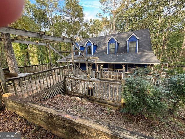 Investor Special with Tons of Potential in Ball Ground, GA! Located in the peaceful Eagles Nest Ridge community, this 3-bedroom, 2-bathroom home sits on just over 2 acres-offering endless possibilities for renovation and value-add improvements. Within the last six months, the owner has completed several updates including repairs to the downstairs bathroom, clean-up of the front deck, improvements to kitchen appliances, and front lot landscaping. While additional upgrades remain, this is a fantastic opportunity for an investor to finish the work or for a new homeowner to complete the vision and transform this property into a truly marvelous home. Nearby comps show a strong market range, providing an excellent opportunity to net a solid return on your investment. Plus, the seller will include a brand-new HVAC system with professional installation with a full-price offer! With multiple storage buildings and workshops already on site, there's even more potential for customization or expansion. Enjoy the quiet, rural charm of Ball Ground while maximizing your investment. Being sold as-is with no warranty, this vacant property is ready for your ideas and improvements. Don't miss this prime opportunity in North Georgia!