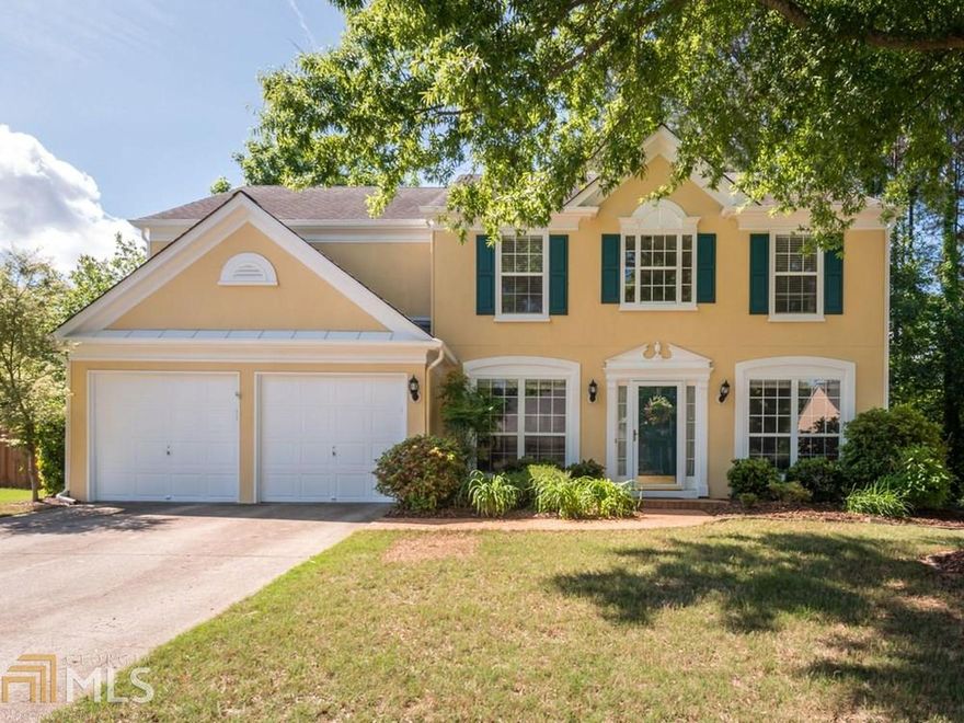 AMAZING OPEN FLOOR PLAN HAS GREAT UPDATES. SEPARATE LIVING AND DINING ROOM. WONDERFUL WHITE KITCHEN (FEATURES STAINLESS APPLIANCES AND GRANITE) OPENS INTO THE 2 STORY FIRESIDE FAMILY ROOM. 3 BEDROOMS AND LAUNDRY LOCATED ON THE UPPER LEVEL. ELEGANT UPDATED MASTER RETREAT W/ LARGE MASTER BATH. DUAL SINK VANITY, SEPARATE TUB AND SHOWER PLUS A WALK-IN CLOSET. AWESOME PRIVATE AND FENCED BACKYARD WITH TILED PATIO PERFECT FOR OUTDOOR ENTERTAINING. EXCELLENT OPPORTUNITY TO LIVE IN POPULAR CHASTAIN GLEN. SWIM TENNIS NEIGHBORHOOD ALSO FEATURES A STOCKED LAKE.