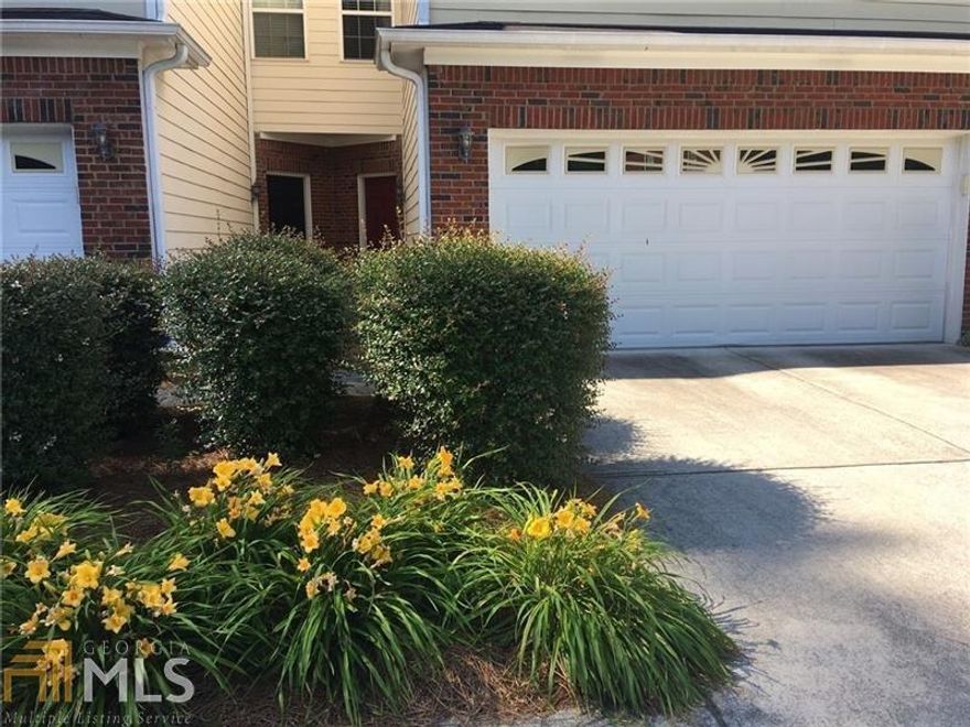 Townhome in A+ condition at an attractive low price! A great opportunity for both investors & owner occupants. Features include hardwood floors on the main level, stainless appliances, 2 very large bedrooms with huge walk-in closets, tons of storage space, a loft that can be used as a sitting area or home office, a private view from the back patio & a 2 car garage! Located in a quiet cul de sac neighborhood. This home is convenient to shopping, major highway & fantastic Grayson schools!