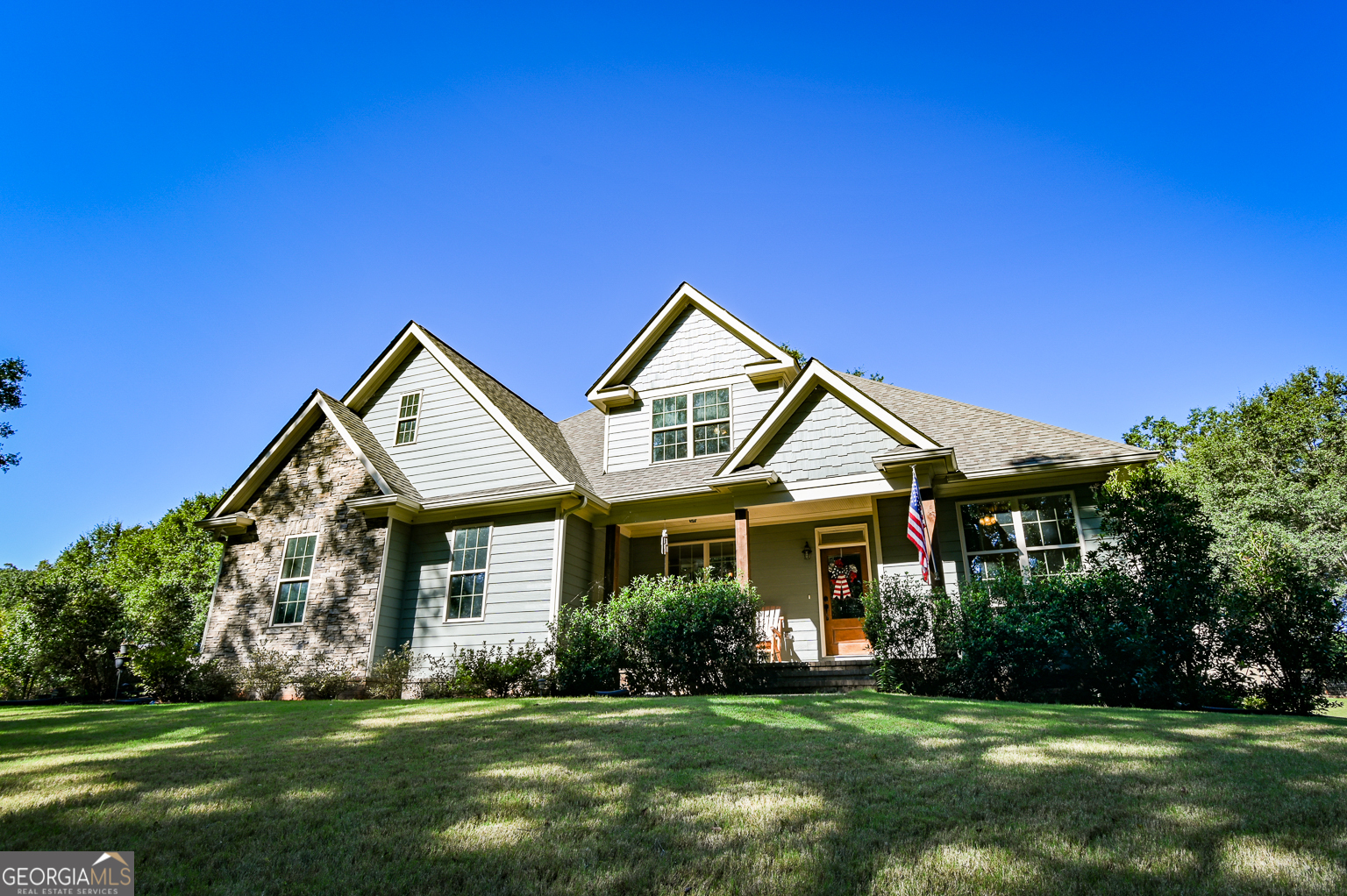 Set on a sprawling 1.5-acre lot, this Winterville beauty combines small-town charm with spacious, modern living. Welcome to 159 Hargrove Circle, a 4 bedroom, 3 bathroom home offering 3,262 square feet of comfort and style. Inside, the main floor boasts a luxurious primary suite with his-and-hers closets, a double vanity, and a spa-like bath with a separate soaking tub and shower. The open floor plan features a beautiful kitchen with plenty of space for cooking and gathering, flowing easily into bright and inviting living and dining areas-perfect for both everyday living and entertaining. Upstairs, you'll find another bedroom along with a large bonus room currently used as a bedroom, offering flexible space for guests, family, or a home office. A two-car garage, abundant storage, and the peaceful setting of a large private lot add to the home's appeal. Enjoy the serenity of Winterville while being just minutes from all the shopping, dining, and entertainment Athens has to offer.