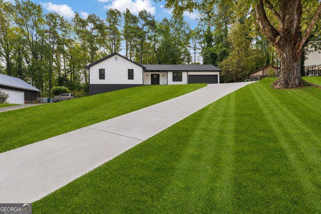 Photo of 3846 Teresa Terrace SW, Lilburn, GA 30047 (MLS # 10826739)