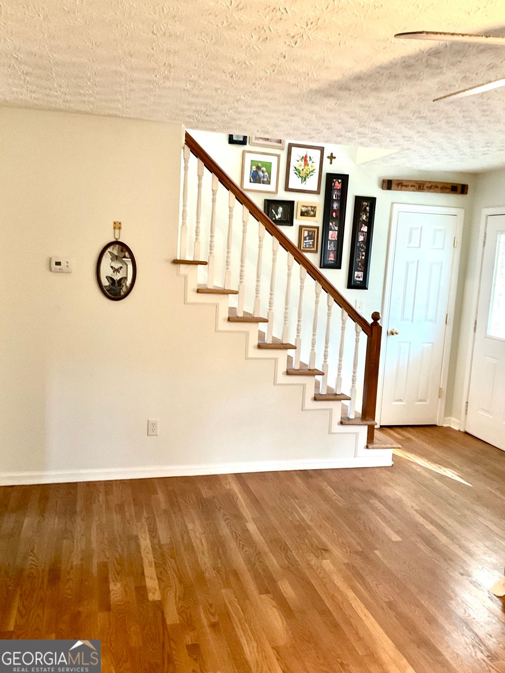 Photo of 5851 Swan Walk, Sugar Hill, GA 30518 (MLS # 10689411)