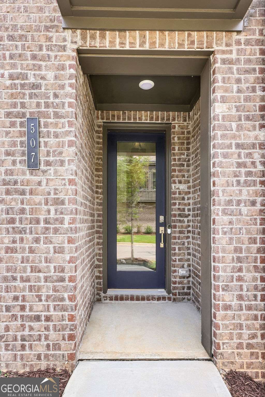 Photo of 507 Red Clay Farm Lane, Suwanee, GA 30024 (MLS # 10855197)