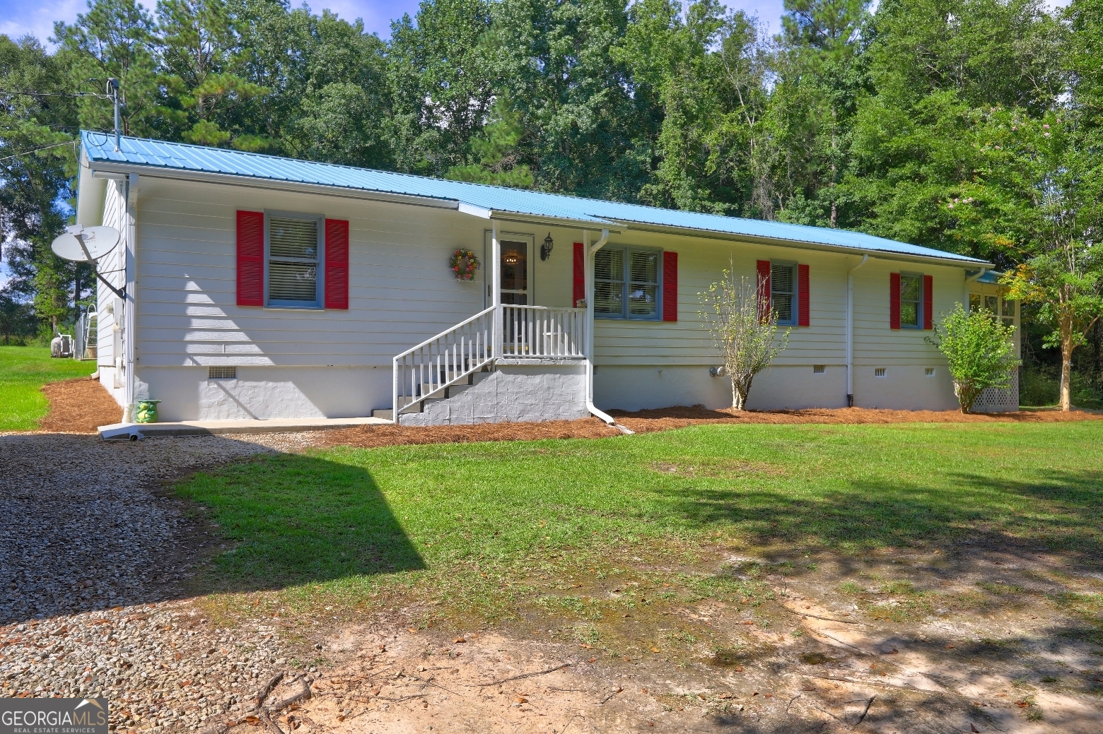 Discover your own slice of heaven in Lamar County! This meticulously maintained property offers the perfect blend of tranquility and modern amenities. Nestled amidst picturesque landscapes, this 3-bedroom, 2.5-bath home boasts high-quality finishes throughout. The primary suite is a true oasis, featuring a luxurious bathroom and a serene sunroom. Enjoy outdoor entertaining in the in-ground pool or relax by the 2.5-acre pond, complete with a fully equipped pavilion. A separate guest house and bathhouse provide additional accommodations for visitors. For the hobbyist, a dedicated craft room and a deer cooler with a walk-in cooler and tables are included. Conveniently located with easy access to I-75 and nearby shopping in Atlanta or Macon, this property offers the best of both worlds: rural charm and urban convenience. Don't miss this opportunity to own your dream country retreat. The home is stick built "Adrian" home that was built on site. There are Airbnb possibilities.