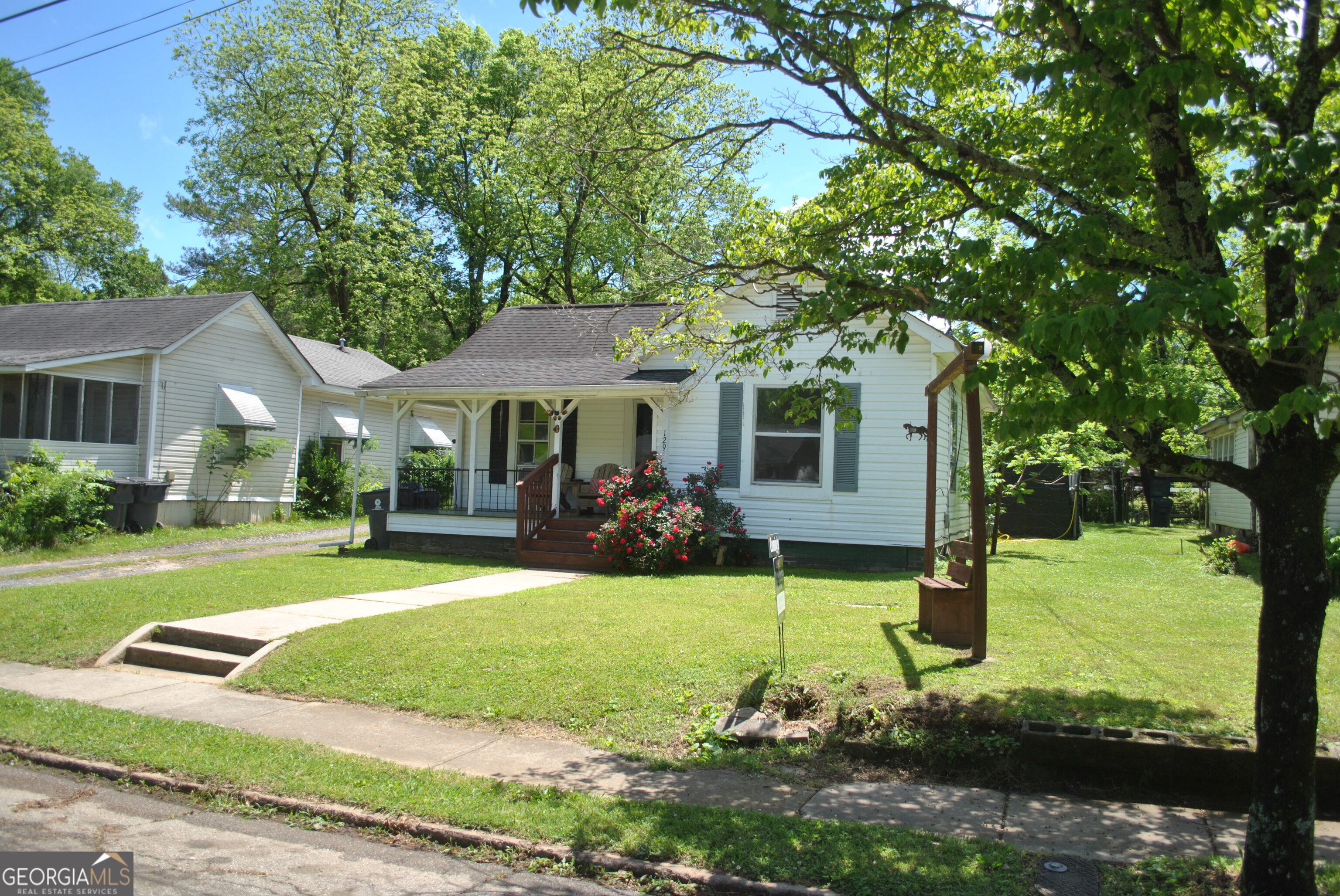 This charming bungalow in Cedartown, GA is a must-see! Located at 129 Cobb Street, this 2-bedroom, 1 bathroom home features beautiful LVP flooring throughout, a large, fenced backyard with 2 outbuildings that have power. The outbuildings are in need of some TLC. The property also includes a convenient location near shops, restaurants, and parks. Don't miss out on this opportunity to own a piece of historic Cedartown! Contact Dawn Astin 770-617-7899 today to schedule a showing.