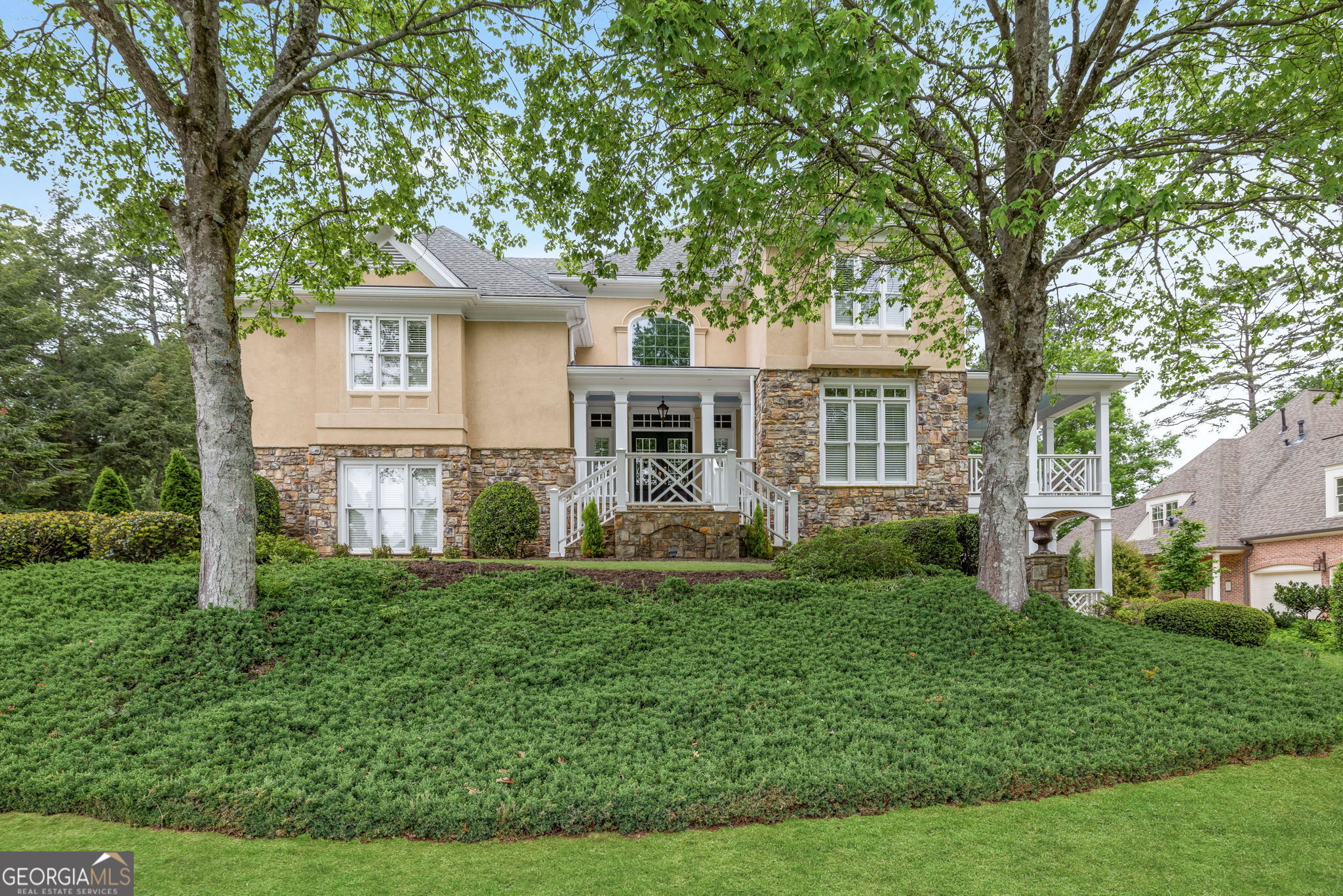 Beautiful custom built home in sought after Sope Creek School district. Open floor plan with stunning finishes throughout, and spaces to do everything. Chef's kitchen W/ light designer cabinets, exotic granite countertops, SS appliances. Large Family Rm off Kitchen with stacked stone fireplace, vaulted oaklined ceiling, connecting to spacious vaulted screened-in porch, overlooking flat, private yard. Huge dining rm, large living room with soaring coffered ceiling and fireplace on main. Office/library also on main, with private covered patio. Master oasis on private level off main, featuring a large bedroom with extended sitting area, a luxurious bathroom with stunning granite, large walk-in custom closets, separate soaking tub, large shower, separate his and her custom vanities. Three more spacious BRs and 2 Baths upstairs. New Hardwood floors on in 2019. New Terrace level (2019) with 12' coffered ceilings, great rm, exercise rm, pool rm, bedroom suite with connected full bath, and plenty of storage. Newer granite in all bathrooms, Custom Closets, Newer Driveway, large 3 car garage with Newer Garage Doors. Newer Roof, 2 Newer Water Heaters, New HVAC in 2021. Updated Fixtures, NightVision Outdoor Lighting. Walk to Sope Creek school. Matriculate to Wheeler HS boasting their STEM program, Ranked #2 in the US.