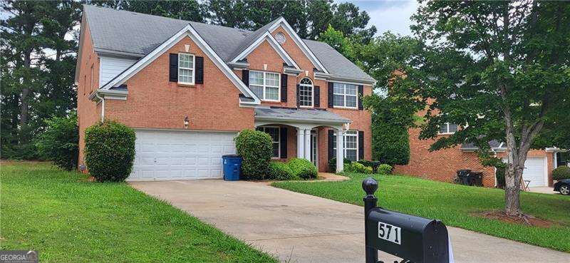 Must see 4 bed, 3 bath home in Clearwater Pointe located in McDonough Georgia! As soon as you enter the home you're greeted by formal two story foyer with views into the private living and dining room. Dining room can easily fit all your guests and close proximity to the kitchen. Dark laminate flooring throughout means NO CARPET! Fireside family room is two story with gas fireplace at the center and views into the backyard means natural light is plentiful. Kitchen includes stained cabinets, kitchen island, pantry, tons of storage and additional eat in breakfast area. Full bedroom and bathroom on the main is ideal for guests, office or playroom. Primary suite has tall tray ceilings with massive bathroom. Bathroom includes double vanities, separate tub/shower and walk in closet. Three more well sized bedrooms share the rest of the second floor. Upstairs is open and airy with views over the foyer and fireside family room. Back patio overlooks the flat and grassy backyard. Can't miss home near schools, shopping, restaurants and more. Swim/tennis community is an added bonus!